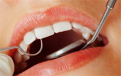 牙齿矫正后疼痛难忍，应采取何种措施？